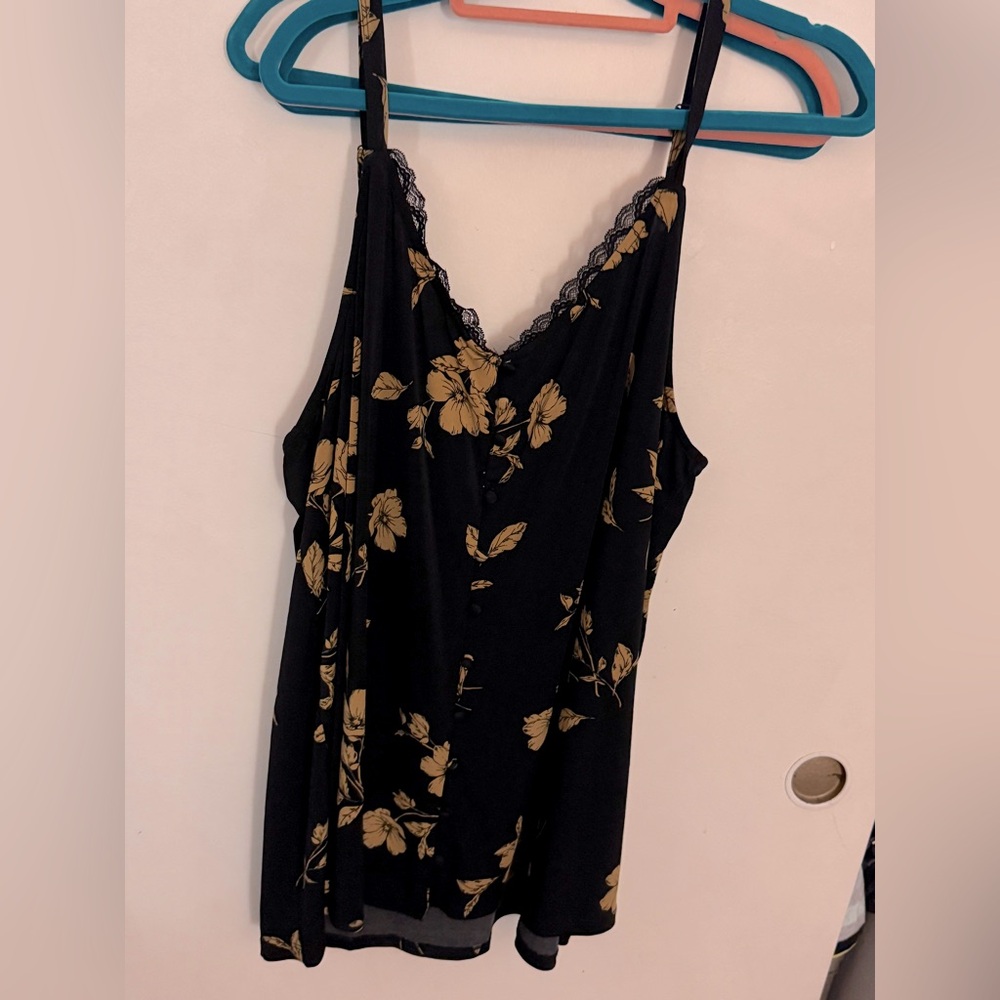 Torrid Size 4 black swing cami with gold/yellow floral pattern.